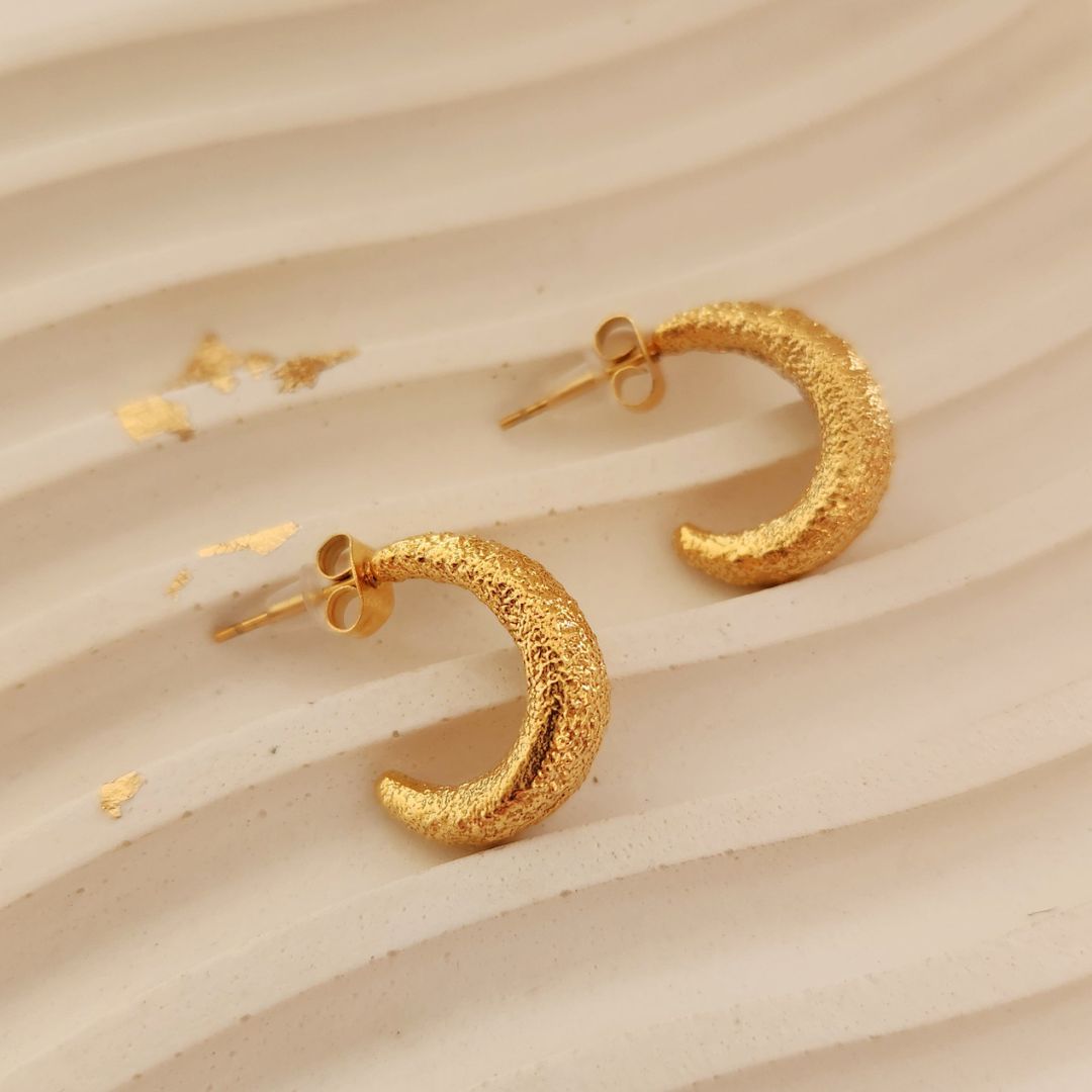 Aretes Aura