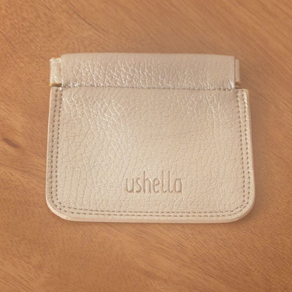Monedero Champagne